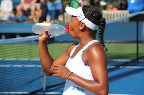 Anderson, Robin (USA) drinks from bottle, crisp